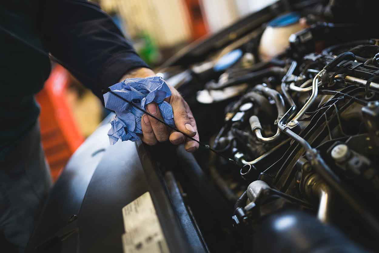 Car mechanic checks over faulty car bought on finance