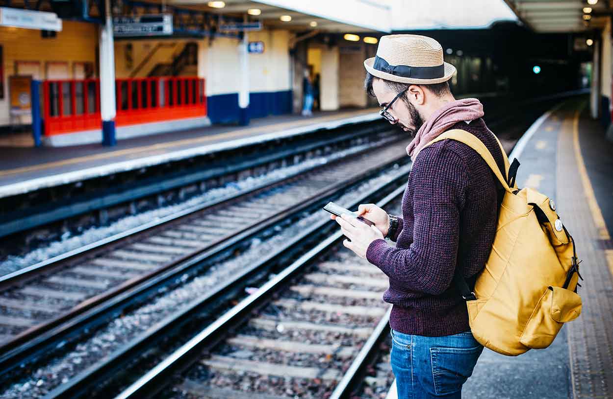 Man using phone to check for car finance without credit check