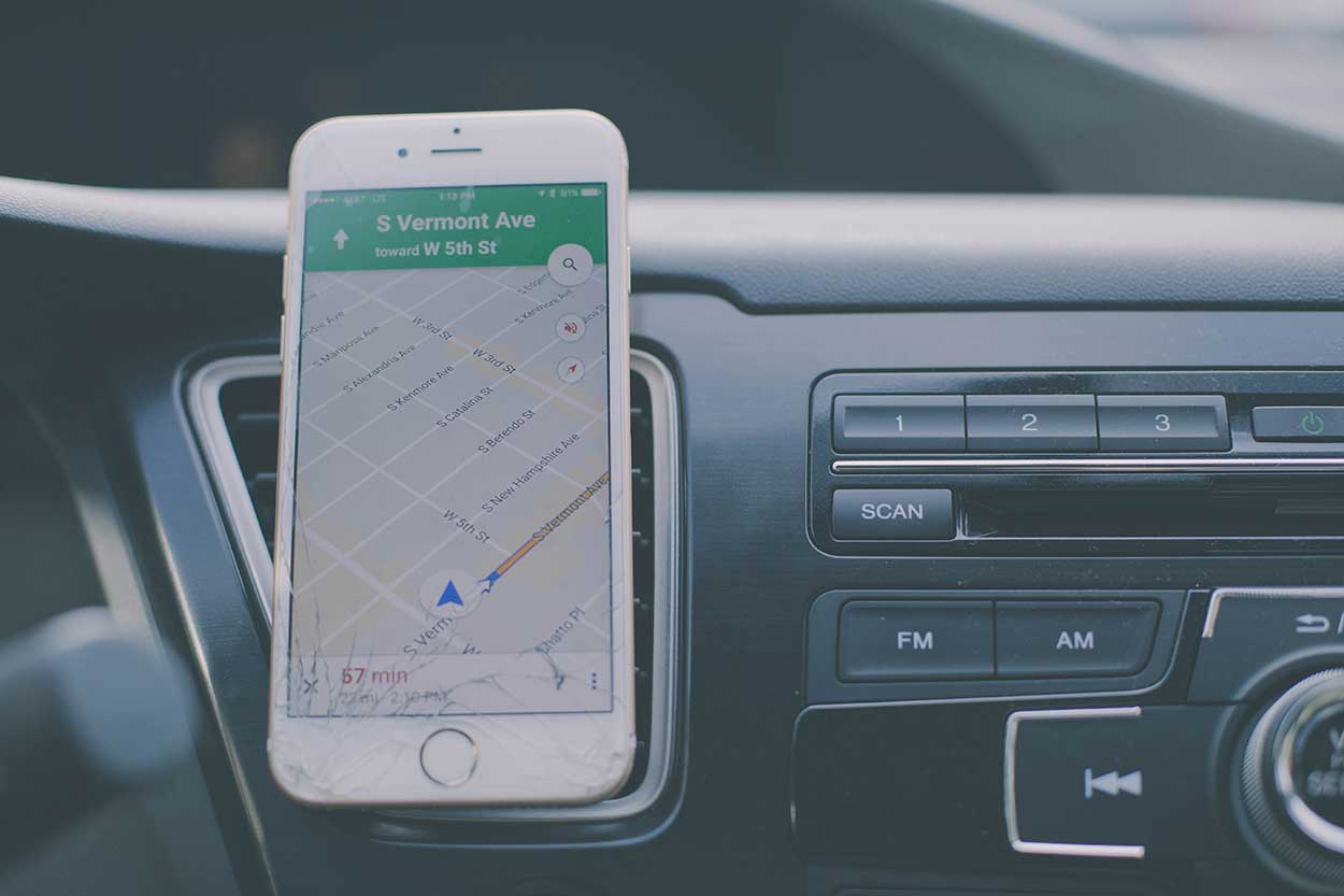 phone being used as sat nav on dashboard of car