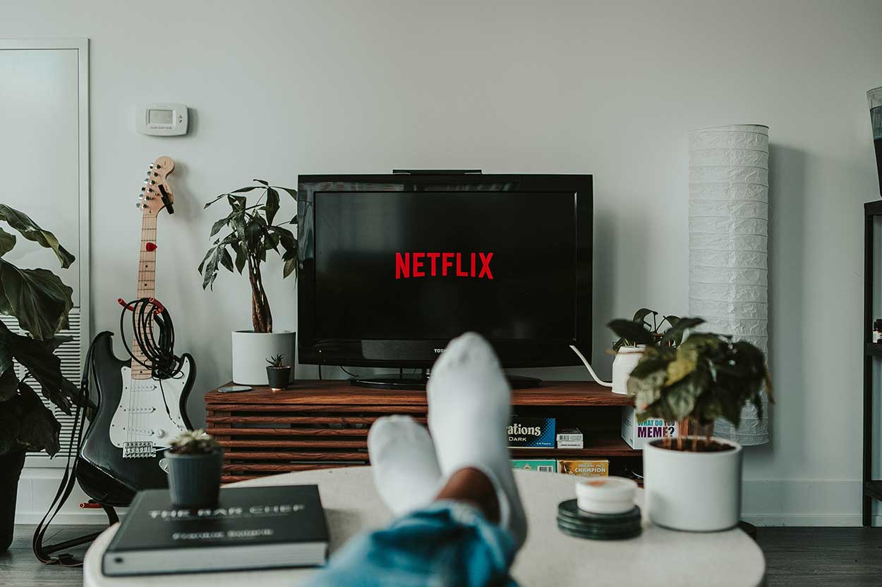 Man watching best car shows during coronavirus lockdown