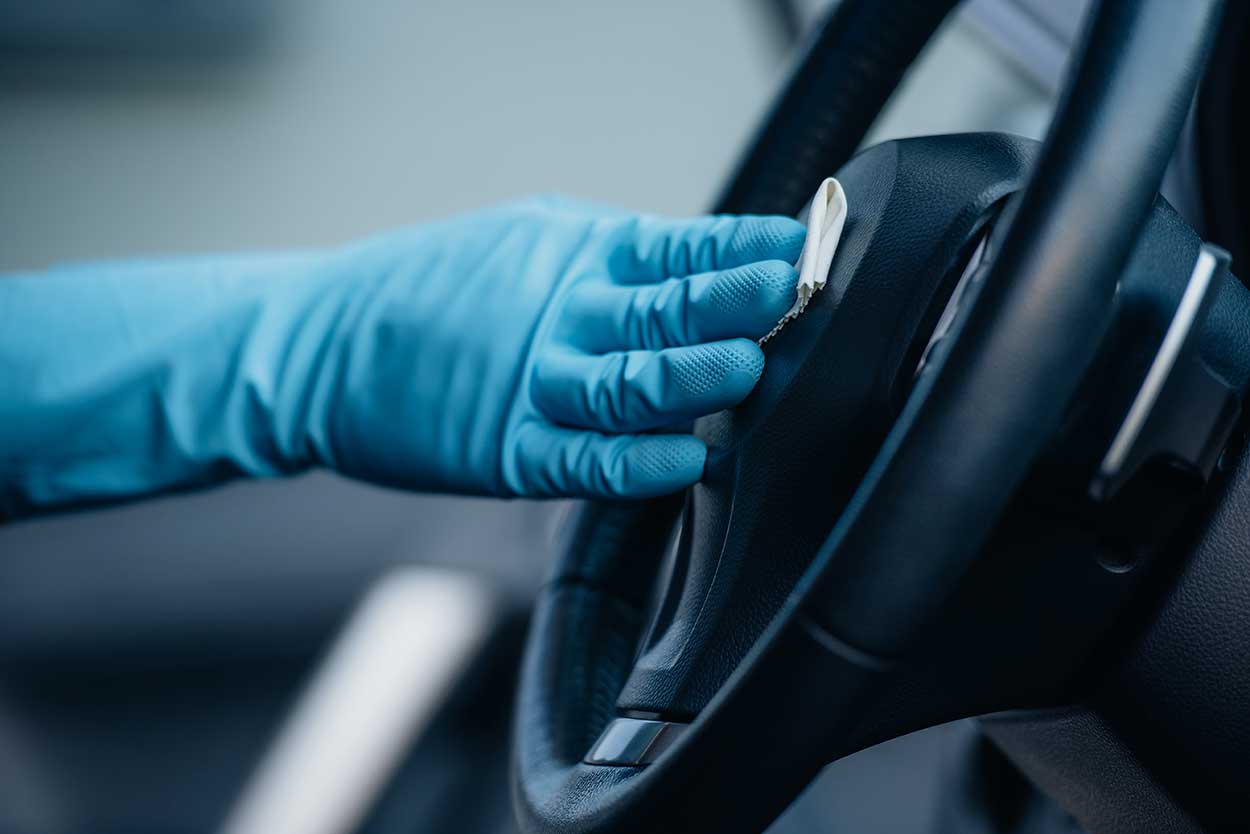 cleaning car steering wheel to keep it coronavirus free