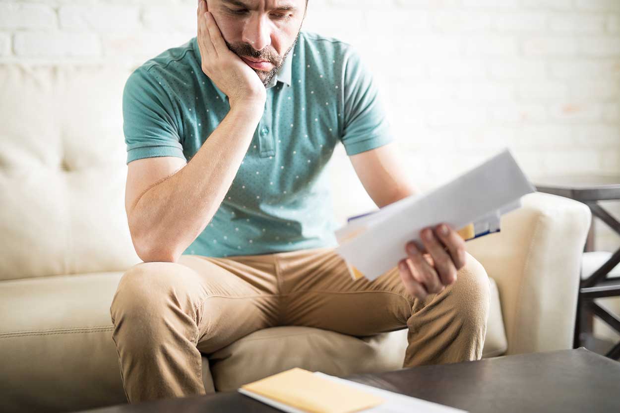 man worried about extending his car finance holiday