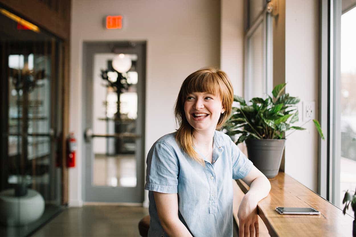 Woman happy after checking her credit score