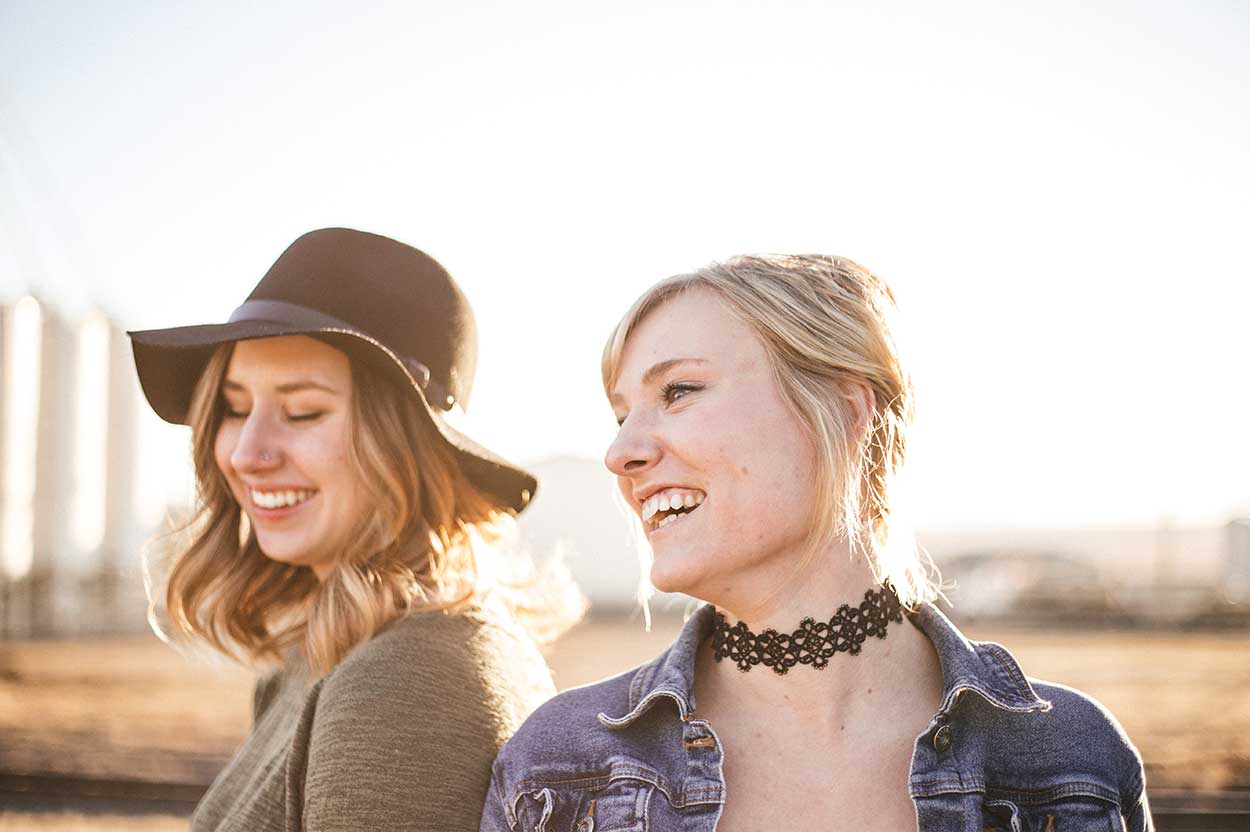 2 women happy knowing what affects their credit scores