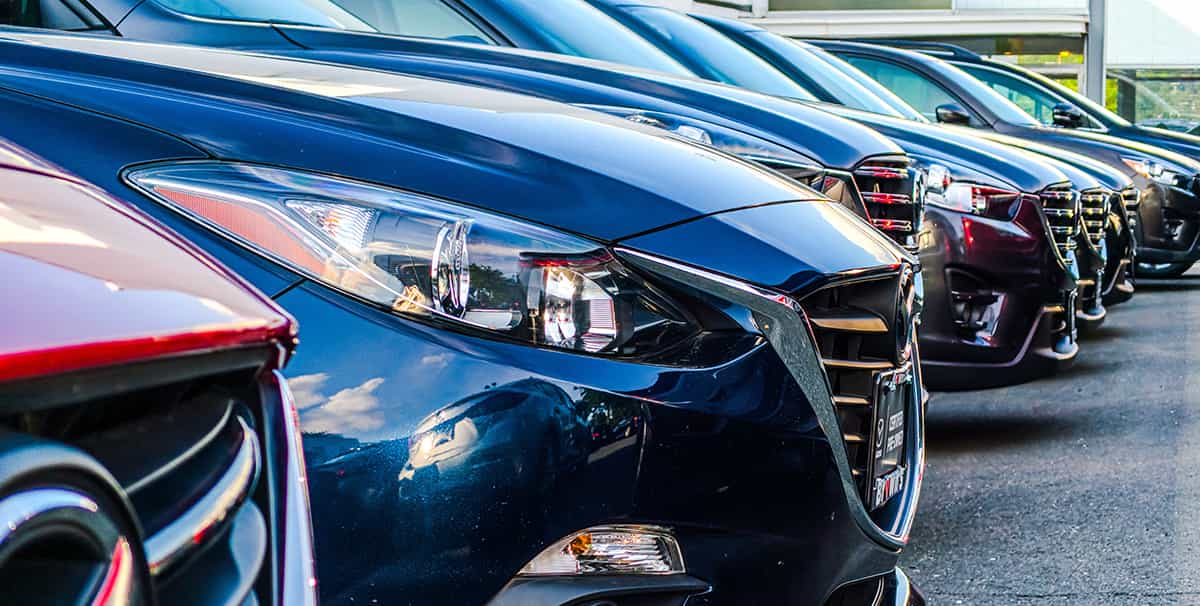 Row of second hand cars at a dealership