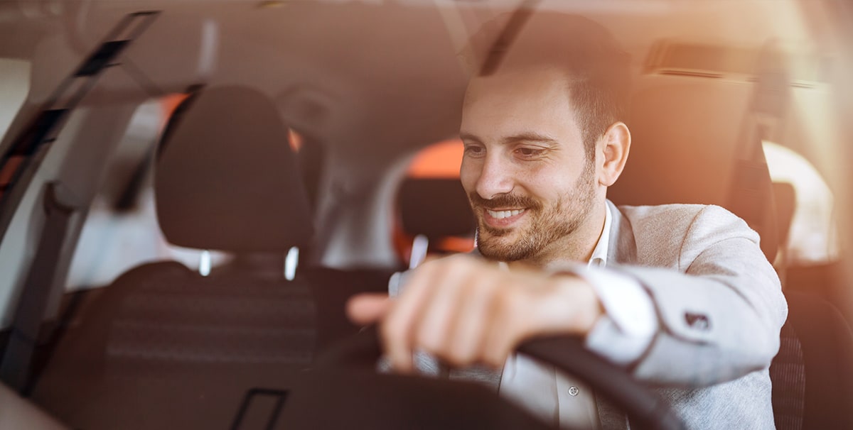 Man test driving a used car