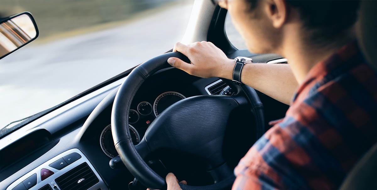 man driving a car he has bought on finance with no deposit on