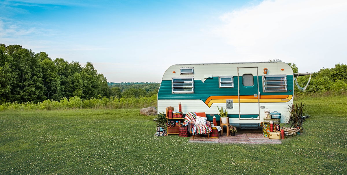 colourful caravan that was towed using an electric car