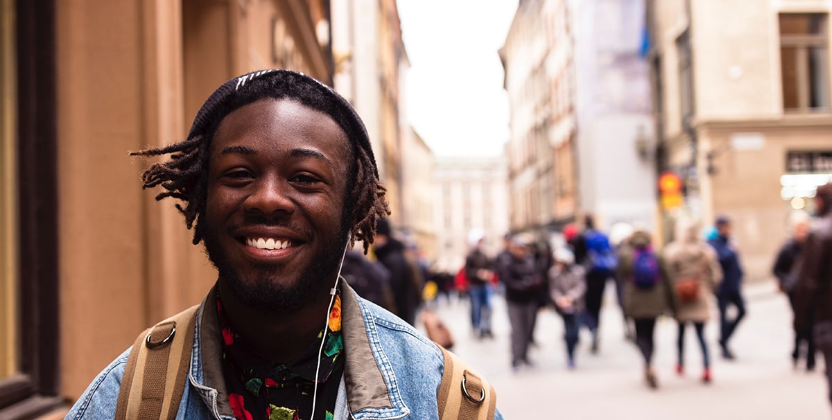 Young man happy he can get a car on a provisional licence