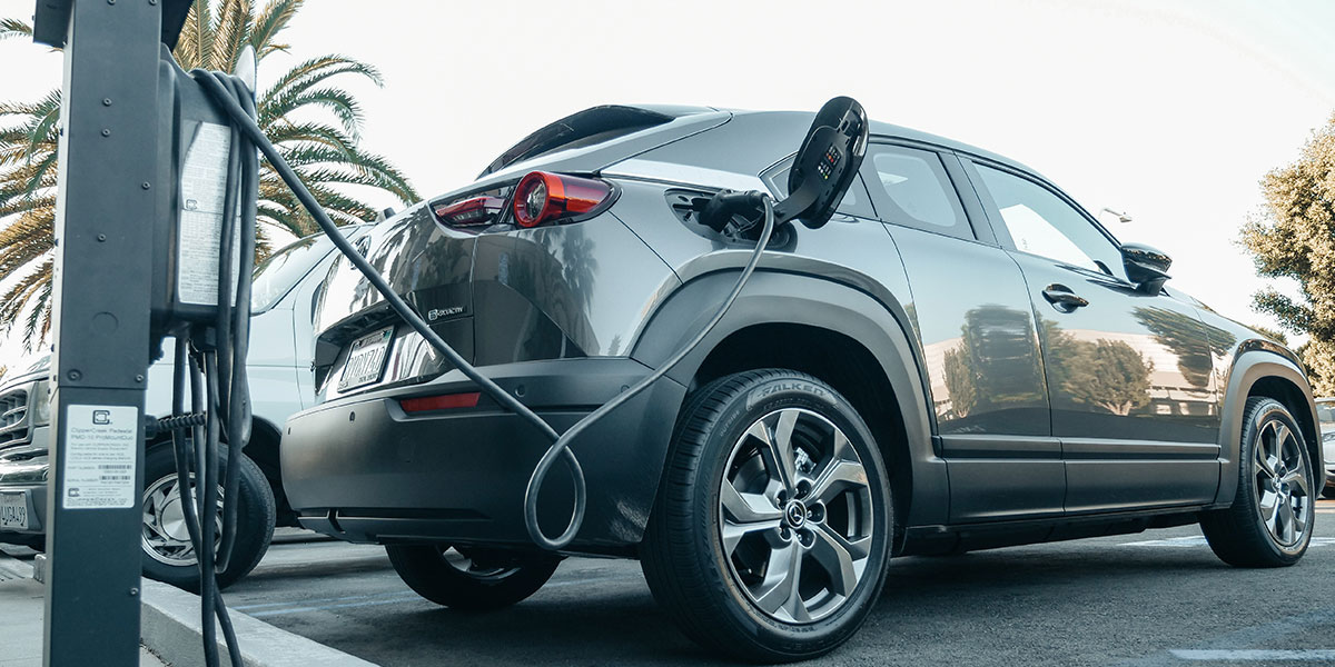 Electric car at charging station