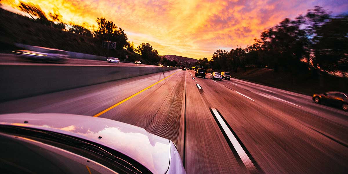 car driving on the motorway at dusk