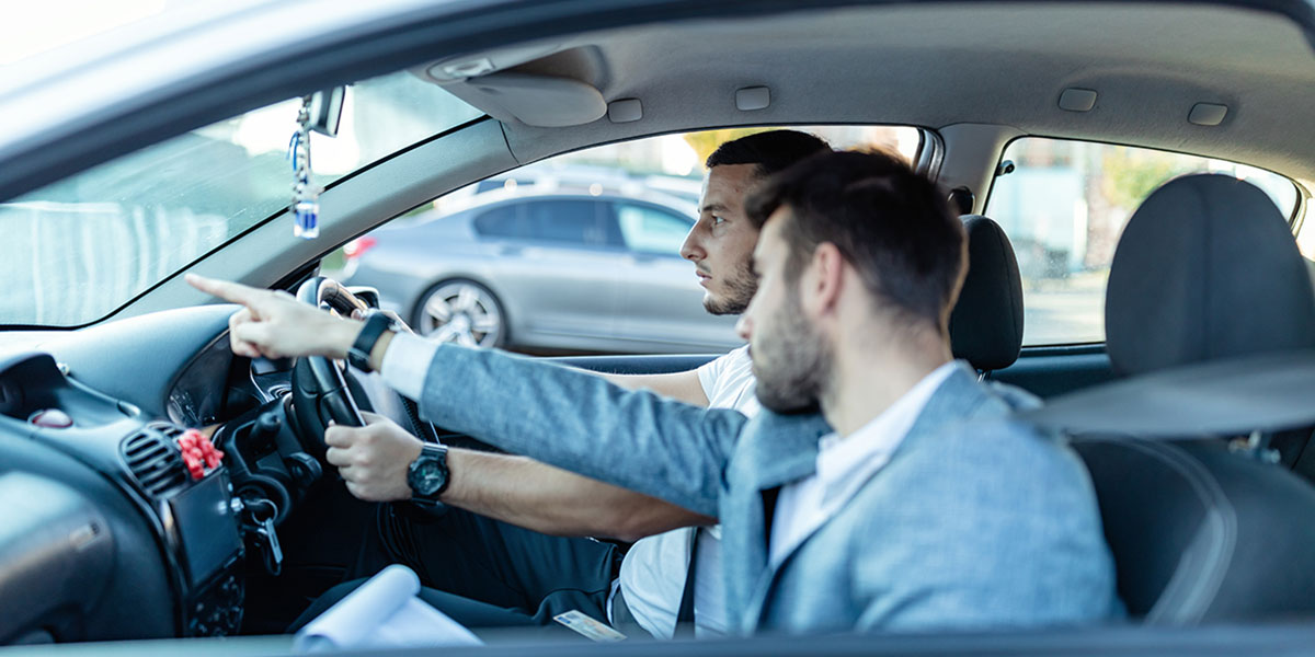 Man having a driving lesson