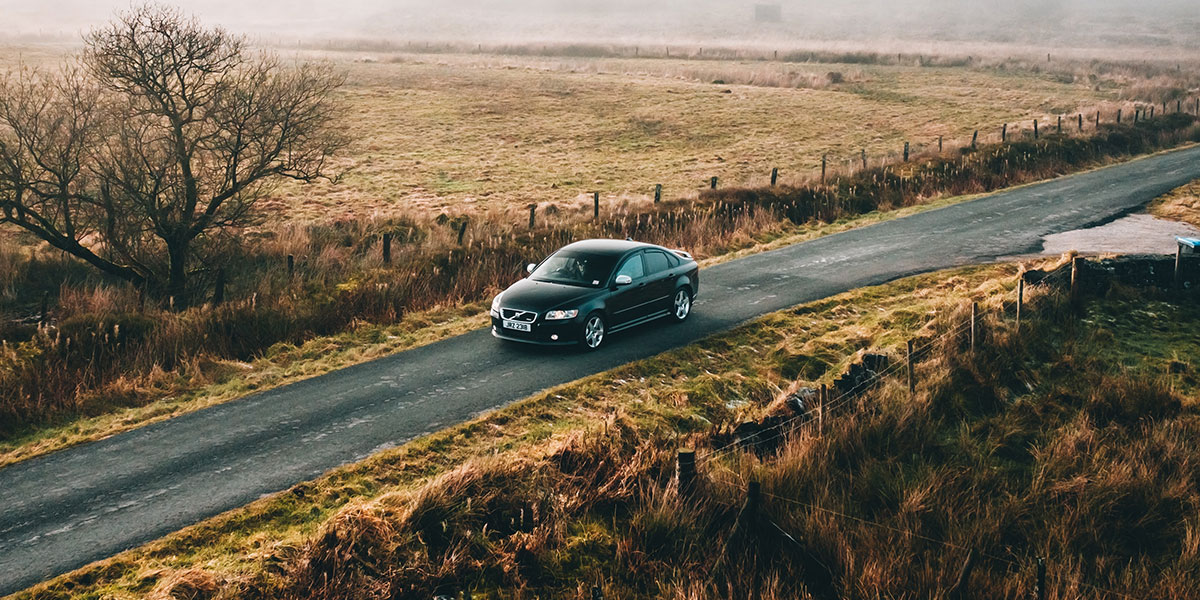 Car driving through the countryside