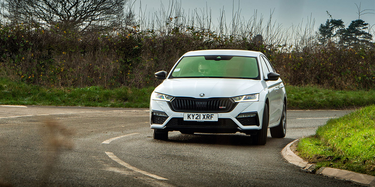 White Skoda Octavia on the road