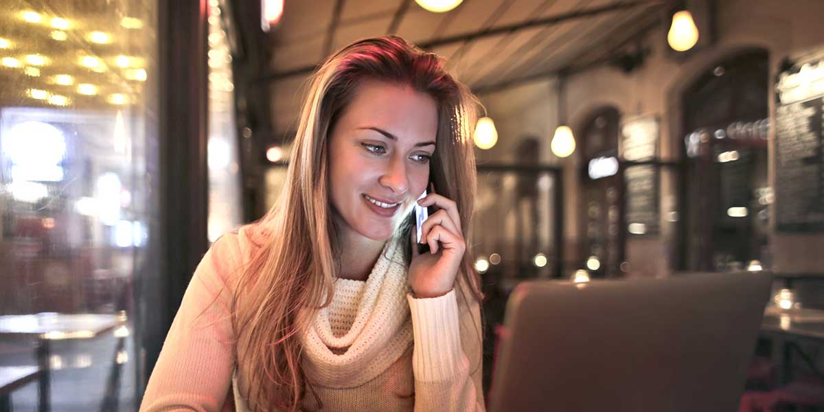 Lady applying for auto finance in a cafe