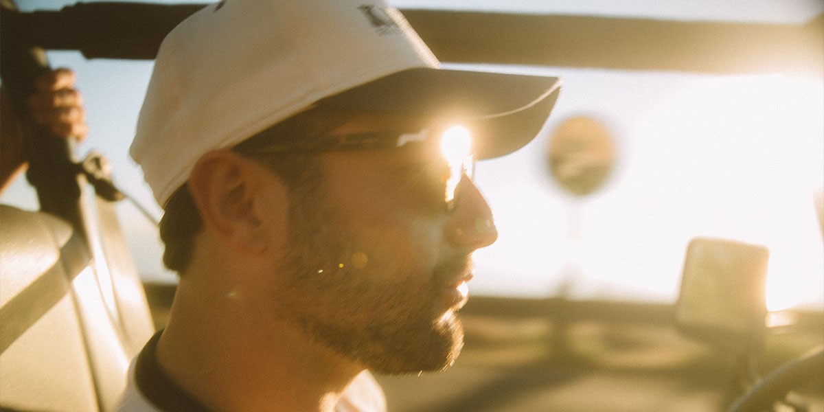 Man driving in sunglasses