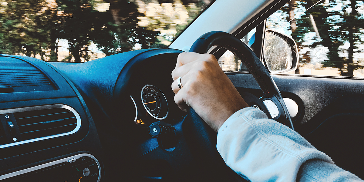 Man driving his car