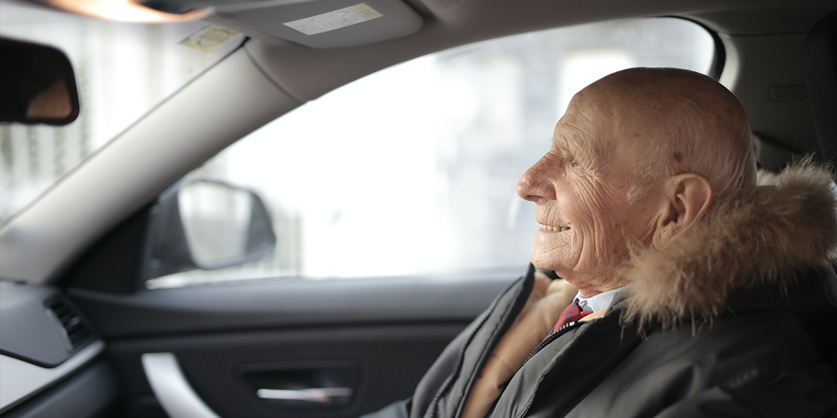 Elderly man in a car