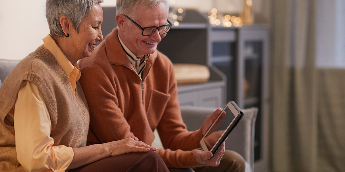 Couple looking at online calculator