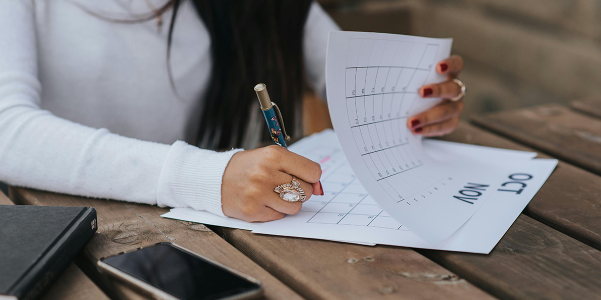 person circling end of PCP term in a calendar