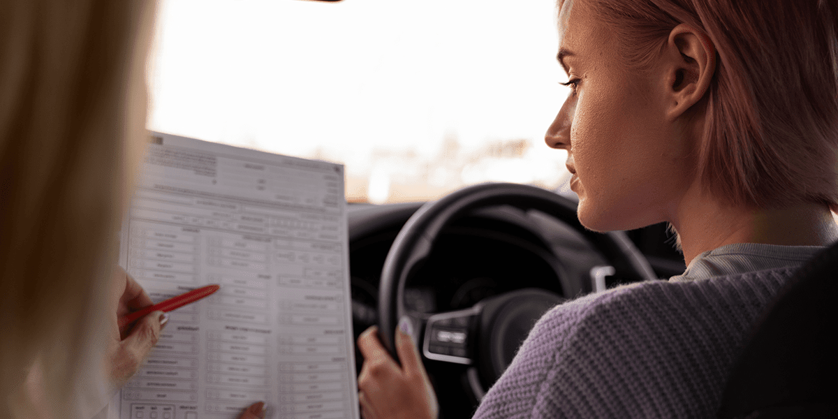 Woman taking a driving test
