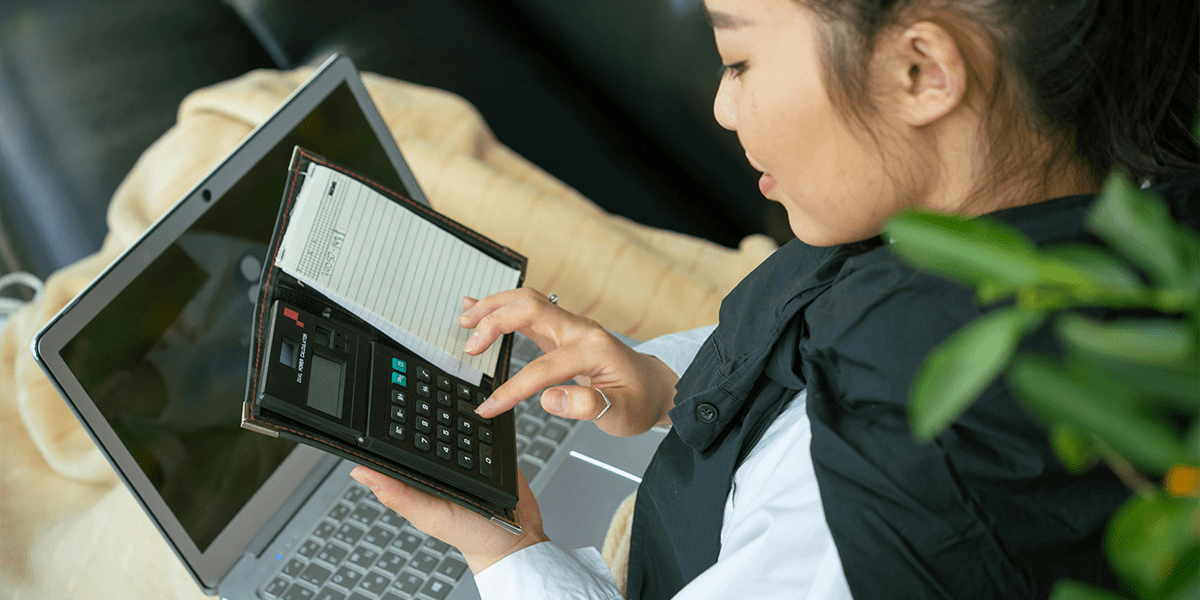 Woman calculating her car budget