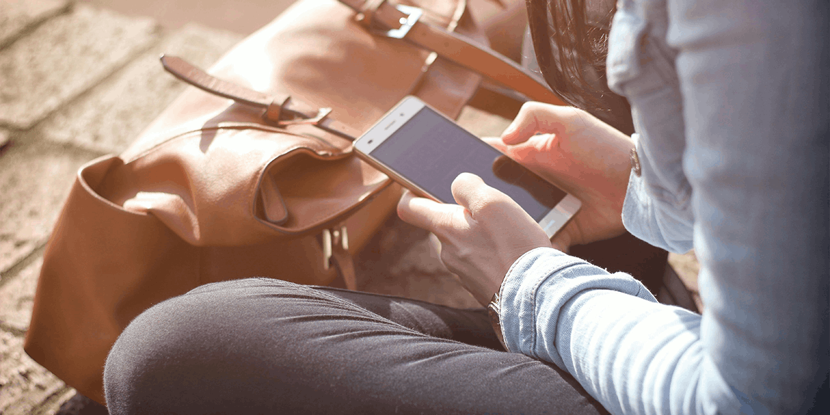 Person using phone to get an instant car loan